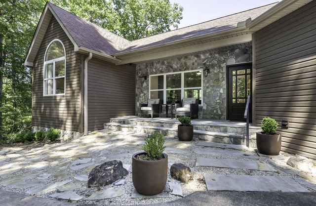 This wooded retreat has everything! Spring & Summer right around the corner!