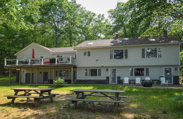 Thompson Lake Retreat with Dock, Spacious Yard, and Game Room!