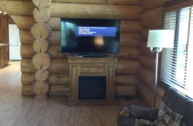 Three level Log Home on Private 40 Acre Estate.