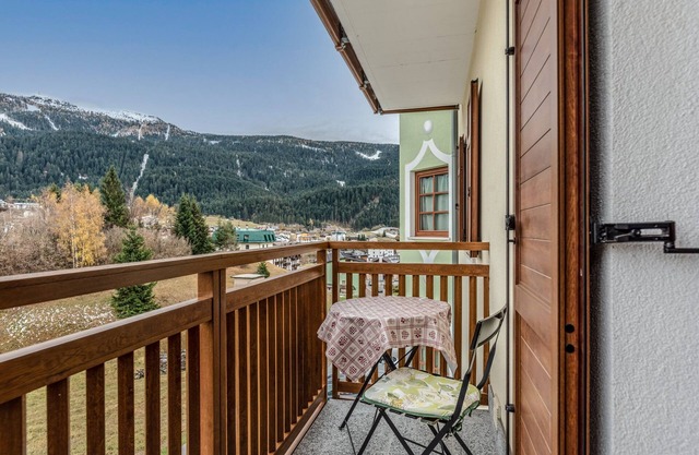Genepì three-room apartment on the 2nd floor with Paganella view; Wifi; parking area