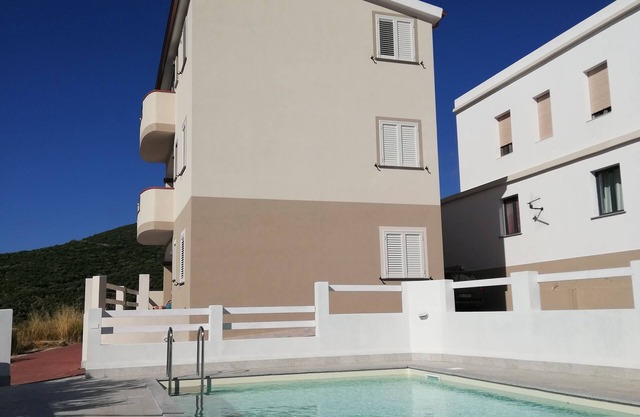 Three-room sea-view apartment with pool in Badesi