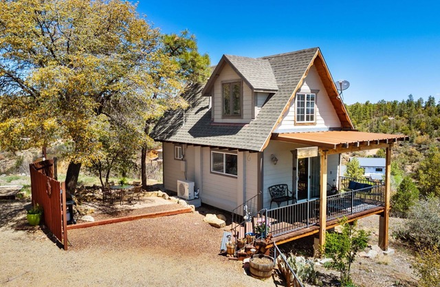Cozy mountain chalet nestled at Thumb Butte with stunning views and rustic charm.