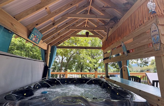 Tiki bar cottage with largest porch in NC and hot tub, views and fire pit!