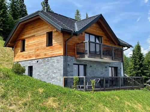 Tomtegl-Bergchalet 9 mit Privatsauna, beheiztem Infinitypool, Kamin, Fitnessraum, auf 1500m Seehöhe