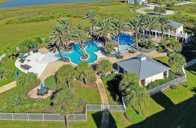 Top floor condo looking out at West Bay and the heated Sunset Pool/Lazy River!