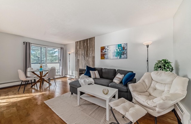 Top Floor Executive Luxury Condo Heated Underground Parking & only 3km’s to Dow