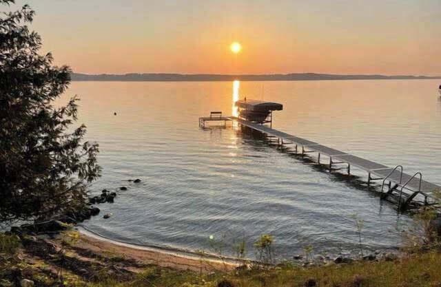 Torch Lake Sonnenuntergang Ansichten