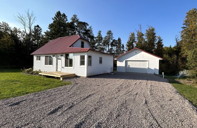 Totally remodeled cabin, a street from the snowmobile/ORV trail with parking.