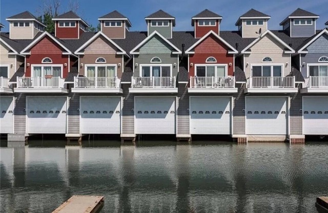 Townhouse on water with boathouse!