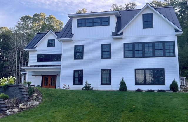 Tranquil lakeside and trailside 5-bedroom house in Lee with gourmet kitchen.