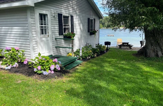 Traverse City's Silver Lake, direct sandy beach waterfront on all sports lake