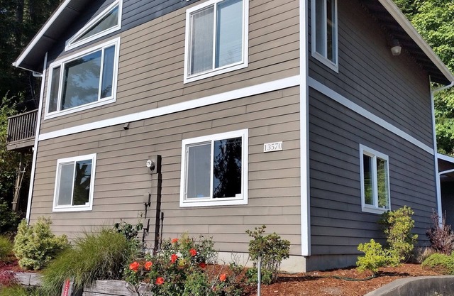 Treetop Retreat on Hood Canal with majestic views of the water.