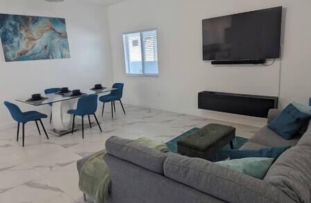 Modern style house, boasting a single-story layout . 3 minutes from downtown!