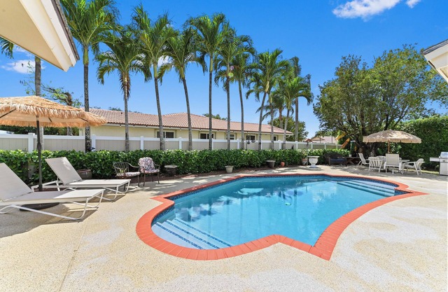 Tropical Oasis Escape with Heated Pool & BBQ