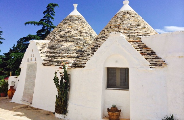 Trulli in historic farmhouse in panoramic position between sea and hills