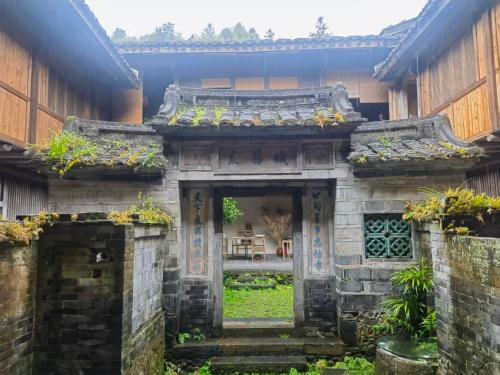 Tsingpu Tulou Retreat 青普文化行馆 南靖土楼店