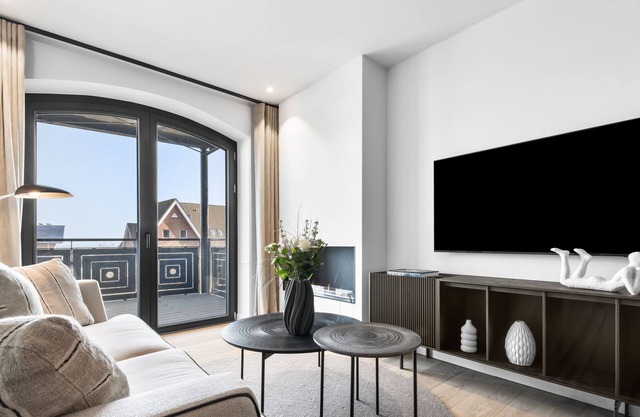Turtle Bay Suite - Luxus auf 65m² in List auf Sylt mit Kamin und Balkon.