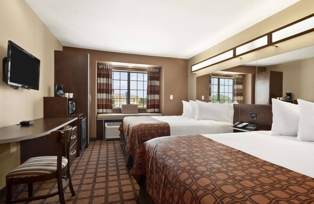 Two Affordable Rooms Ready for Family Stay with Complimentary Breakfast