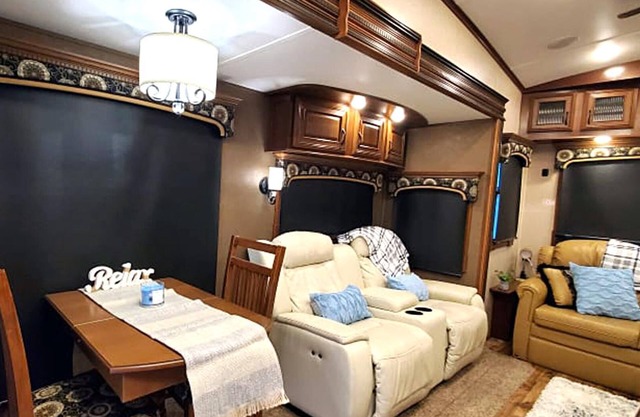 Two bath fully stocked RV with free golf cart