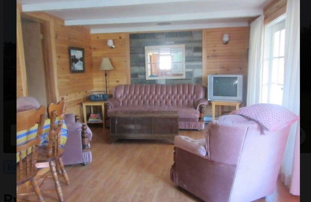 Two Bedroom Cottage With Open Concept Leading To Large Patio And Screened Porch.