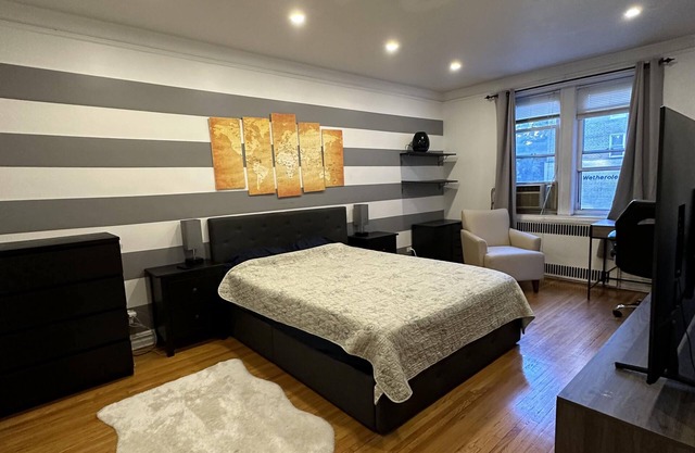 Two Large Cozy Bedroom Condominium that is 20 mins train ride to Manhattan