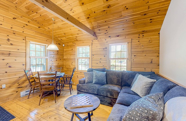 Two log cabins on 5 acres with patios, grill, firepit, outdoor games, & W/D