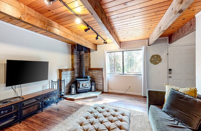 Two-story dog-friendly condo with balcony, washer/dryer, & full kitchen