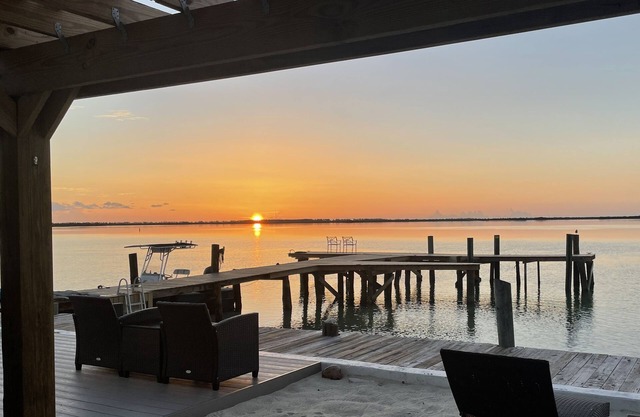 Unique, authentic, exquisite waterfront cottage with a dock.