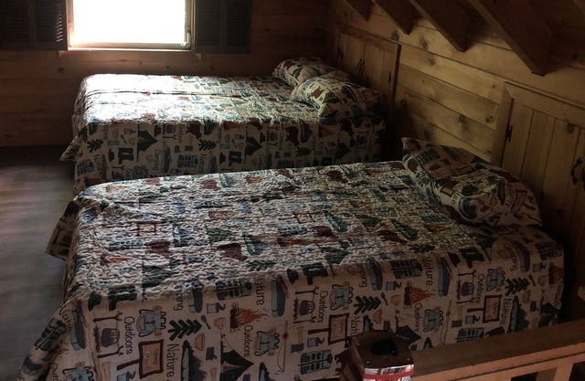 Unique Birch Island camp on Indian Pond in St. Albans, Maine
