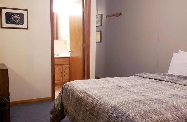 Unique, Private guestroom inside the Lodge at North Ironwood Acres resort with TWO QUEEN beds and two small bathrooms. DOG FRIENDLY!!