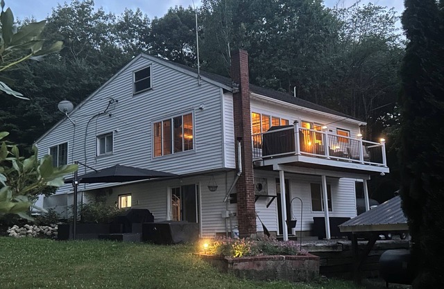 Unique rental with two houses on the lake in charming Lyman with AC, WiFi