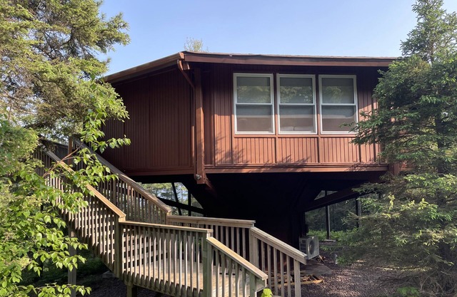 Unique Treehouse in the woods with a fabulous Lake Superior view