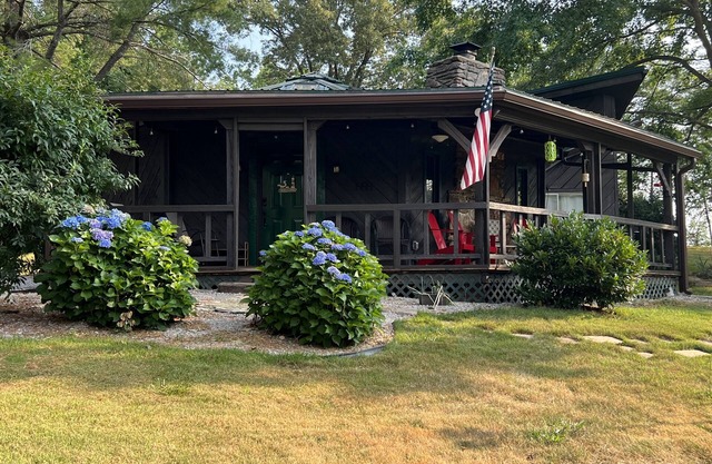 Uniquely styled octagon shaped home. Just 2 miles to the lake