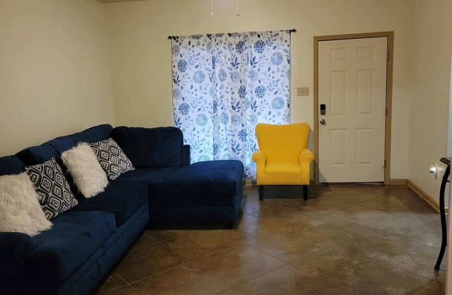 Unit A- A charming 3-bedroom, 2-bathroom duplex offering a cozy atmosphere.