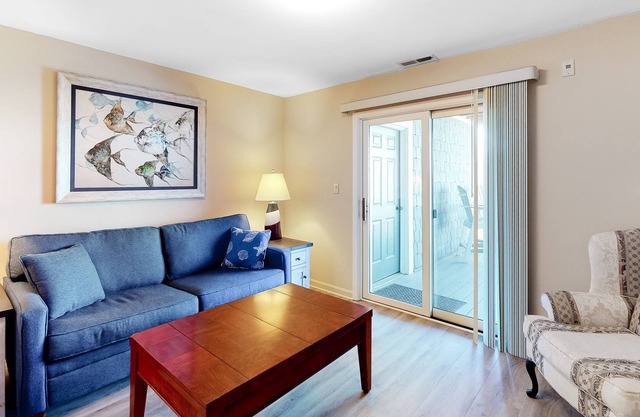Updated Bayfront Condo w/ Canal Views, Balconies, Shared Pools - Walk to Beach
