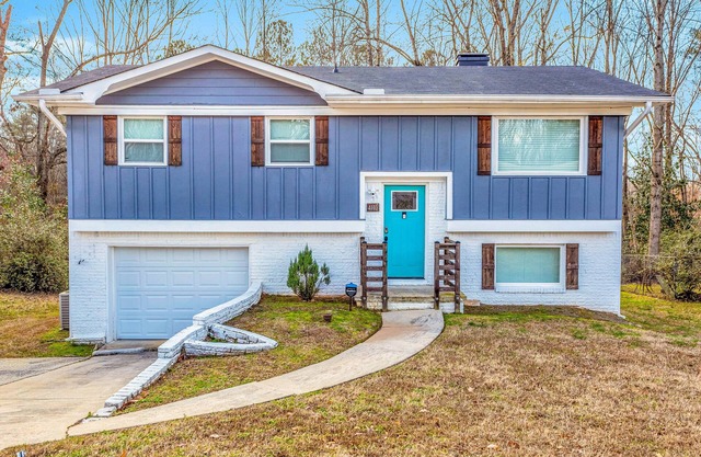Updated home in quiet neighborhood with sunroom, balcony & central AC