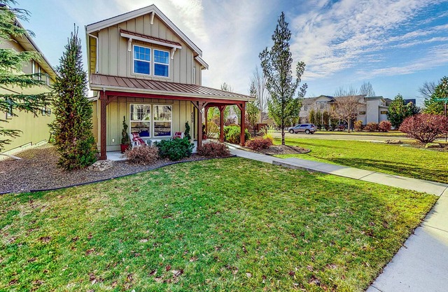Updated home on corner lot with fireplace, private patio, grill & quiet location