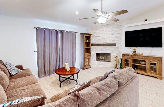 Updated home with patio, grill, wood-burning fireplace, central AC, & internet