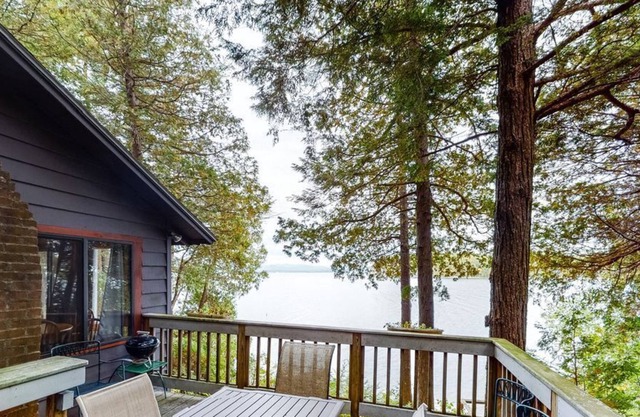 New listing! Newly-remodeled lakefront home in a wooded setting w/private dock
