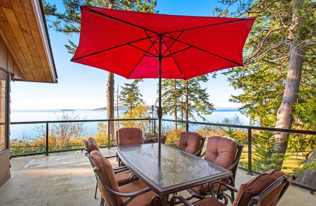 Updated sound front home with water & mtn views, fireplace, firepit, balcony