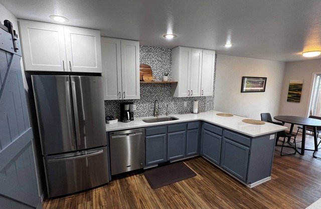 Updated townhouse in quiet cul de sac. Private fenced yard & off-street parking.