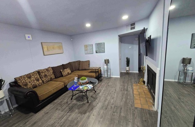 UPTOWN LOCATED!! Lovely with fireplace & Garden