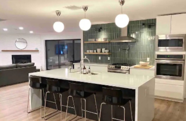 Uptown remodeled home and heated pool