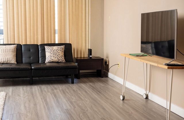 Urban 1BR Condo, Skyline Views, Near Bow River