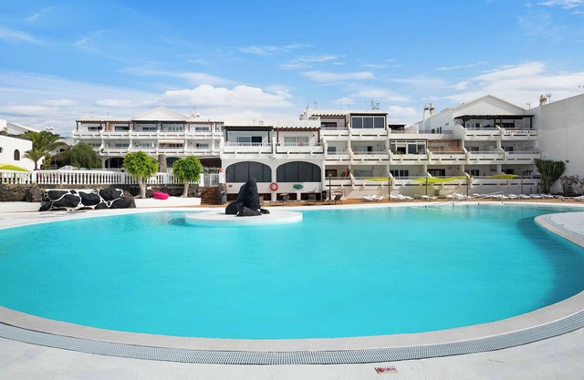 Ferienwohnung 'Casa Las Palmeras' mit Gemeinschaftspool, privater Terrasse und WLAN