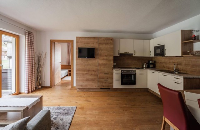 Ferienwohnung "Almrausch" - Gästehaus Fohringer