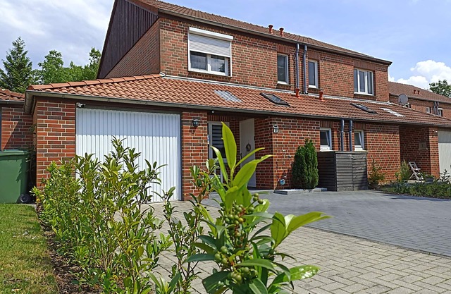 Ferienhaus mit überdachter Terrasse und Garten