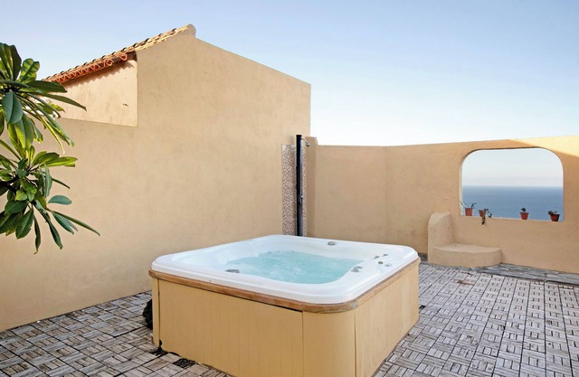 Ferienhaus 'Whirlpool Comfort Sea Views Stay' mit Meerblick, privater Terrasse und WLAN
