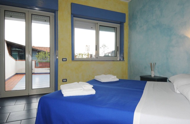 Vacation Home "Oasi Azzurra - Trilocale Plus 1" with Sea View, Shared Pool & Shared Terraces