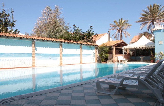 Vacation Home "Oasi Azzurra - Monolocale Standard 2" with Shared Pool & Shared Terrace